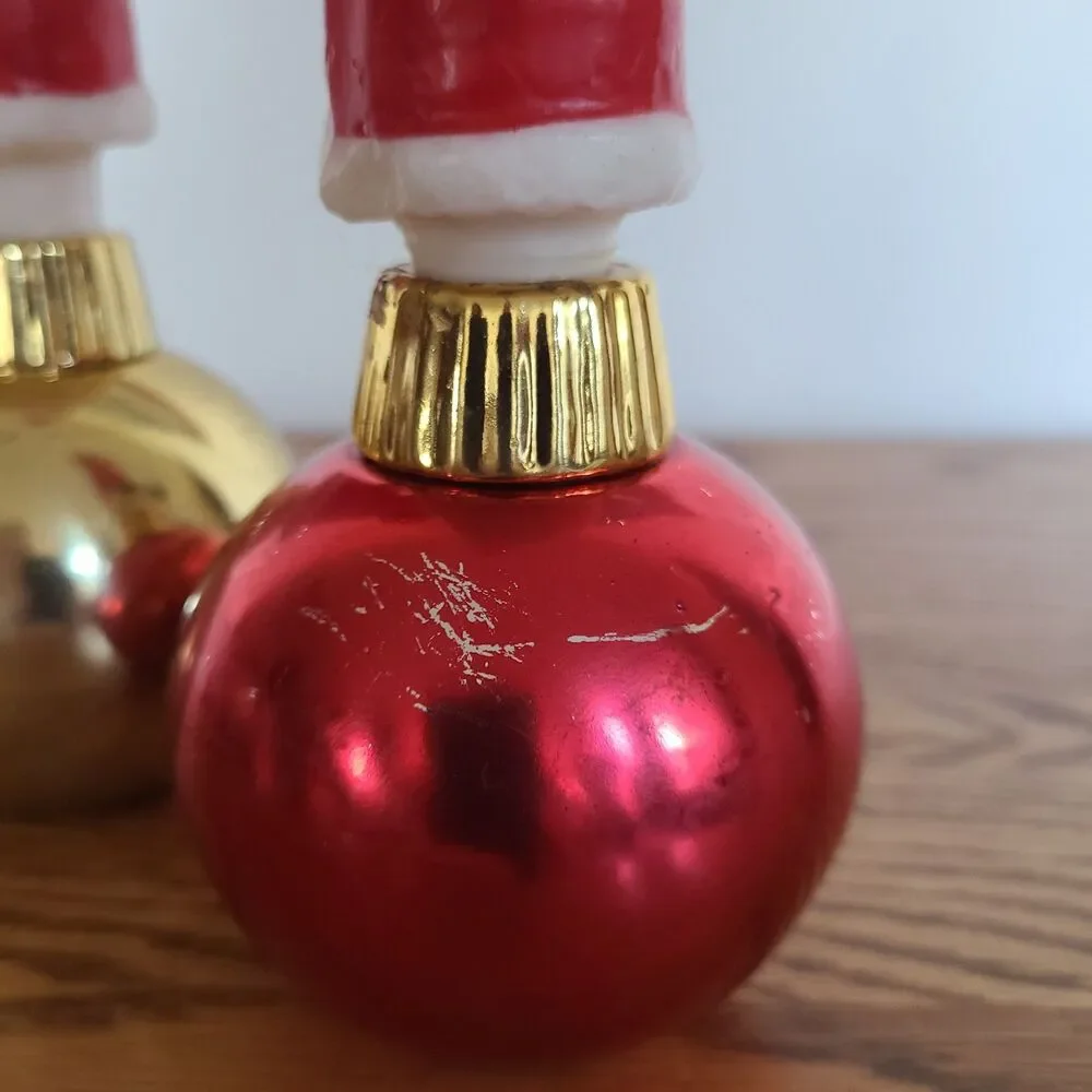 Two Vintage Santa Claus Character Candles In Christmas Ornament Candle Holders